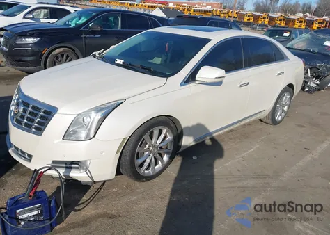 2014 Cadillac Xts Luxury from USA, damaged, VIN 2G61M5S34E9119943